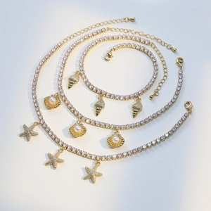 Gold ocean beach anklet set with zircon starfish seashell and conch pendants