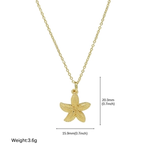 Golden starfish pendant necklace with detailed relief texture on a pure white background