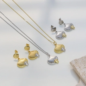 Elegante goud en zilver tweekleurige schelp ketting en oorbellen set met zeeschildpad