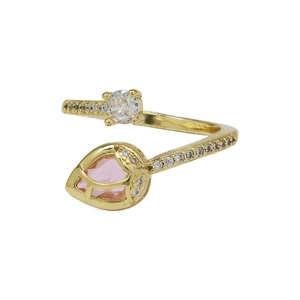 Close-up of golden tulip ring with pink teardrop crystal and sparkling cubic zirconia