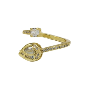 Detailed macro view of gold tulip open ring with pear cut cubic zirconia stones