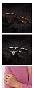 Detalle de anillos minimalistas en oro y plata con un diamante solitario brillante