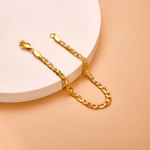 Elegant gold-plated stainless steel Figaro cross bracelet with polished lobster clasp
