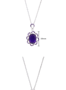Detail shot of purple crystal drop pendant showing 26mm length and silver chain