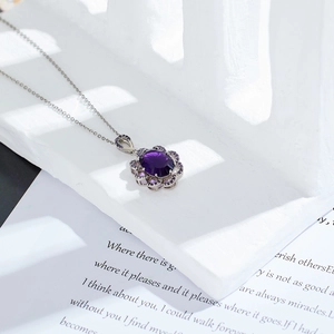 Elegant silver sunflower necklace with oval purple crystal pendant for women