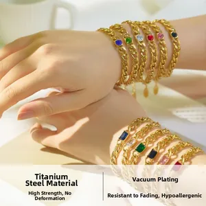 Detail of 18k gold plated stainless steel bracelets with colorful cubic zirconia stones