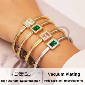 Detail of luxury emerald and zircon stainless steel bangles with vacuum plating
