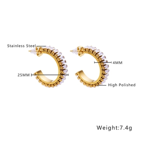 Detailed macro view of 25mm gold stainless steel C-hoop earrings with paved zircon stones