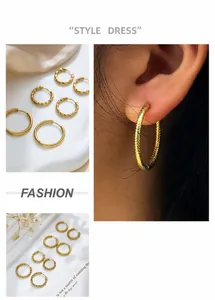 Detail of gold-plated stainless steel hoop earrings in various sizes for a layered look