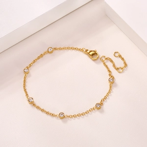 Minimalist 18k gold plated stainless steel bracelet with six round sparkling zircons
