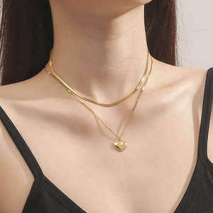 Zweilagige Edelstahlhalskette in Gold mit Herzanhänger und Love You Gravur für Damen