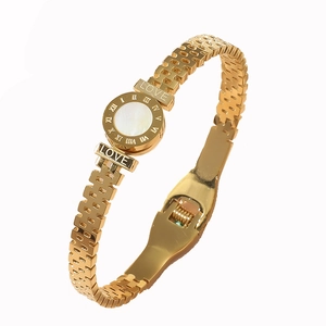 Golden Roman numeral LOVE bracelet in stainless steel with mother of pearl inlay