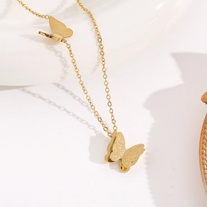 Elegant 18k rose gold butterfly necklace with matte and polished layered pendant