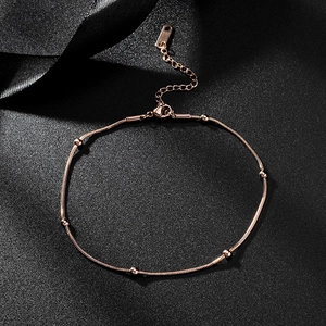 Minimalist rose gold titanium steel beaded anklet with lobster clasp on black satin ribbon