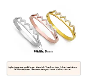 5mm wide wave-shaped titanium steel bangles with pavé rhinestones in three colors