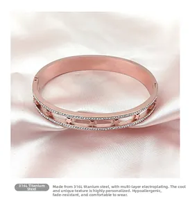 Detail of rose gold 316L titanium steel bracelet with hollow stars and small diamonds