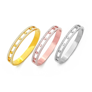 Fashion hollow star bangle with crystal accents in gold rose gold and silver finishes