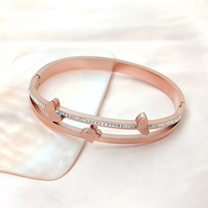 Double-row rose gold butterfly bracelet in titanium steel with sparkling zircons