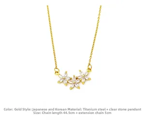 Detailed view of gold star flower necklace with zircon petals and 44.5cm titanium chain