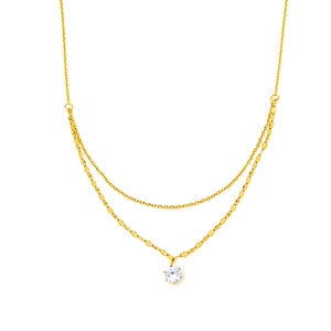 Double-layered gold-tone water wave chain necklace with a sparkling round zircon pendant