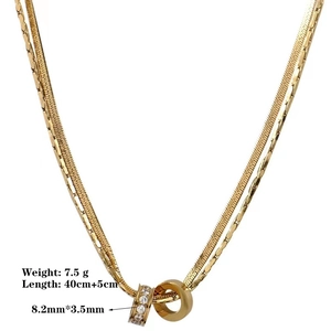 Collana a doppio strato dorata con catena a serpente e pendente ad anello con cristalli