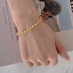 Minimalist 18K gold-plated stainless steel bead chain bracelet for women on fashion magazine