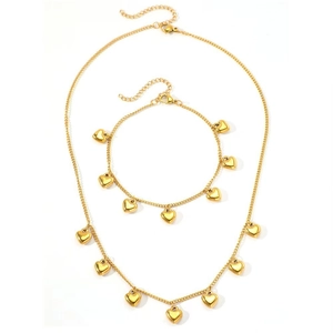 Gouden roestvrijstalen sieradenset met een ketting en armband met hartjes