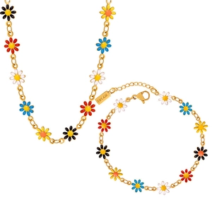 Gold daisy pearl jewelry set featuring colorful enamel flower necklace and bracelet