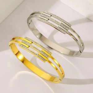 Titanium steel open bracelets in gold and silver with geometric diamond pave design