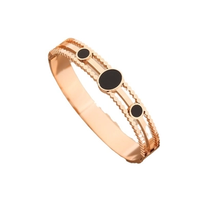 Elegant rose gold titanium steel bracelet featuring black enamel inlays and beaded edges