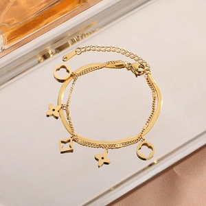 Pulsera de trébol de doble capa chapada en oro de 18K con cadena de serpiente y dijes