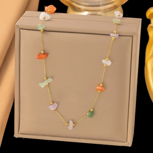Colorful irregular natural stone necklace with gold chain in orange and purple tones