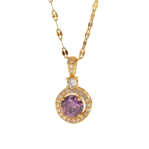 Elegant gold necklace with circular purple gemstone pendant surrounded by white crystals