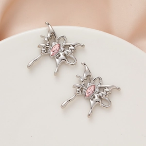 Y2K fluid metal butterfly pendant with pink zircon on elegant silk background
