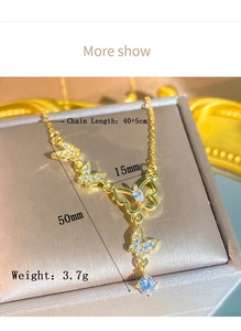 Détail du collier papillon doré avec pendentifs en zircon et dimensions affichées