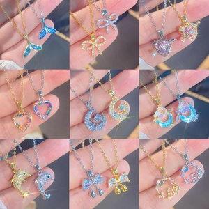 Funkelnde Zirkonia Titanstahl Halskette Set mit Schmetterling und Herz Anhänger