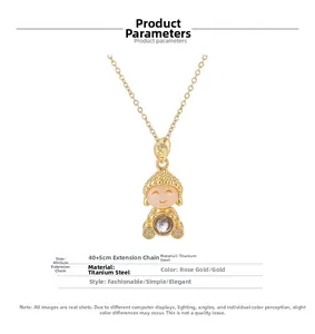 Detail of gold Buddha pendant with projection stone and decorative Ruyi patterns