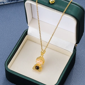 Golden buddha projection pendant necklace in luxury green jewelry box for women