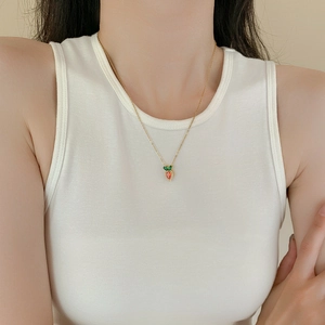 Cute carrot pendant necklace in gold finish with red and green zircons for women