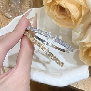 Luxurious H-letter cuff bracelet with micro-paved cubic zirconia in gold and silver finish