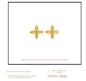 Detaillierte Makroansicht der goldenen Blumenohrringe mit Zirkon und anlonia und anlaufgeschützter Beschichtung