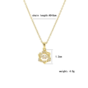 Gold star necklace with moving center stone and sparkling pavé accents on 45cm chain