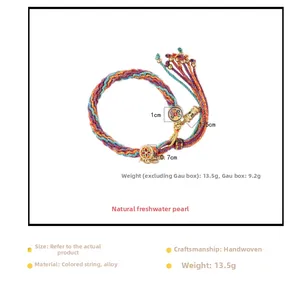 Detailed view of hand-woven colorful rope bracelet with alloy prayer box and tassel