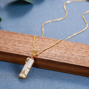 Bamboo style white faux jade pendant with 18k gold plating on elegant steel chain