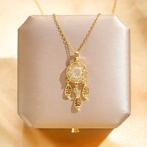 Titanium steel dreamcatcher necklace with opal and zirconia on a gold display box