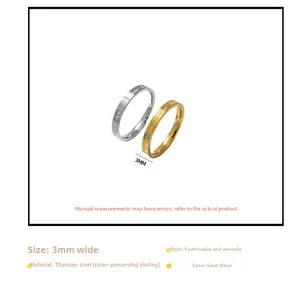 Detailed shot of 3mm gold and silver titanium steel rings with Forever Love engraving