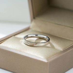 Polished silver stainless steel ring engraved with Forever Love in a luxury gift box