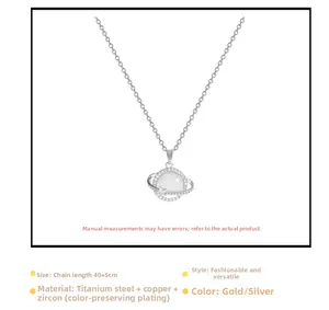 Detailed view of opal planet pendant necklace with adjustable chain length and zirconia star