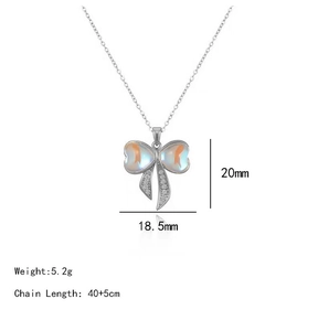 Detailed view of 20x18.5mm zircon bow pendant with iridescent stones on 40+5cm chain