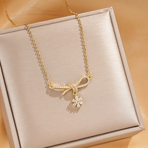 Zircon bow pendant titanium steel necklace in gold finish with jewelry box display